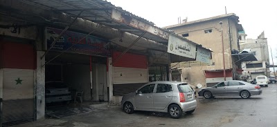 الورشة الفنية لدهان السيارات