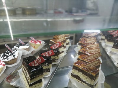 بوظة و حلويات ملك الهريسة أبو عمار