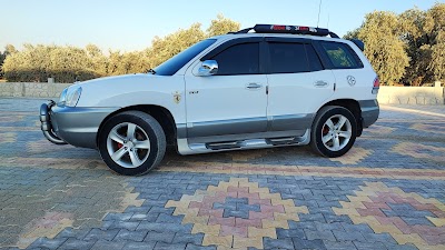 معرض الطالب للسيارات والعقارات
