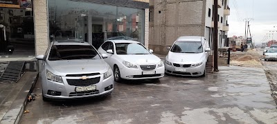 معرض جنود و أبو رايد للسيارات والعقارات