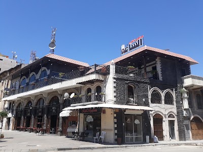مطعم و كافيه الساعة