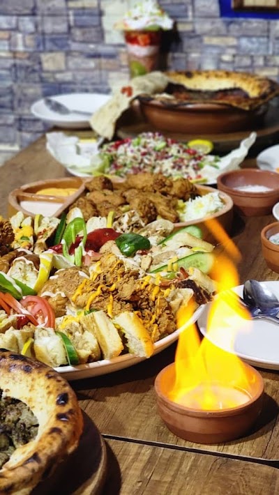 Pottery House مطعم بيت الفخار